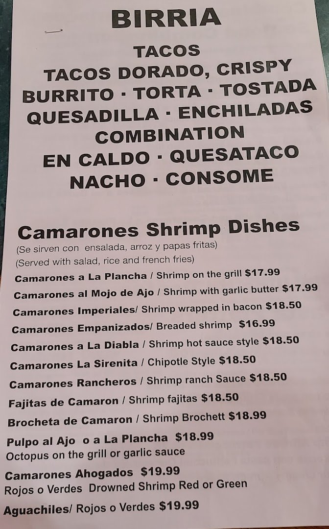 Tables set for Mexican seafood dishes.